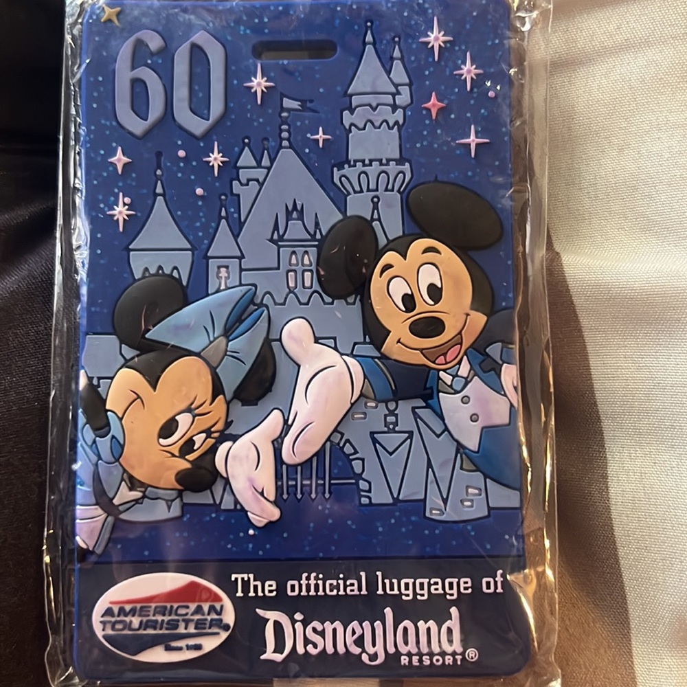New in plastic - Disneyland 60th anniversary Luggage tag